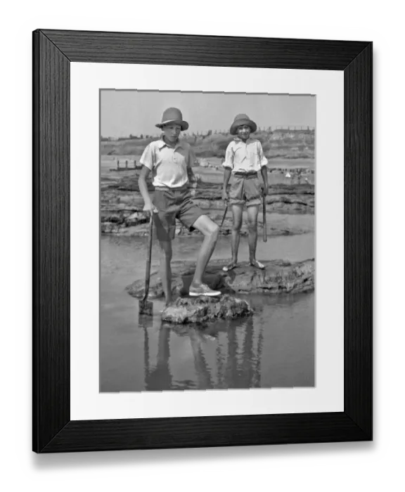 Framed Print : Two boys exploring rock pools at the seaside Framed Print : Two boys exploring rock pools at the seaside