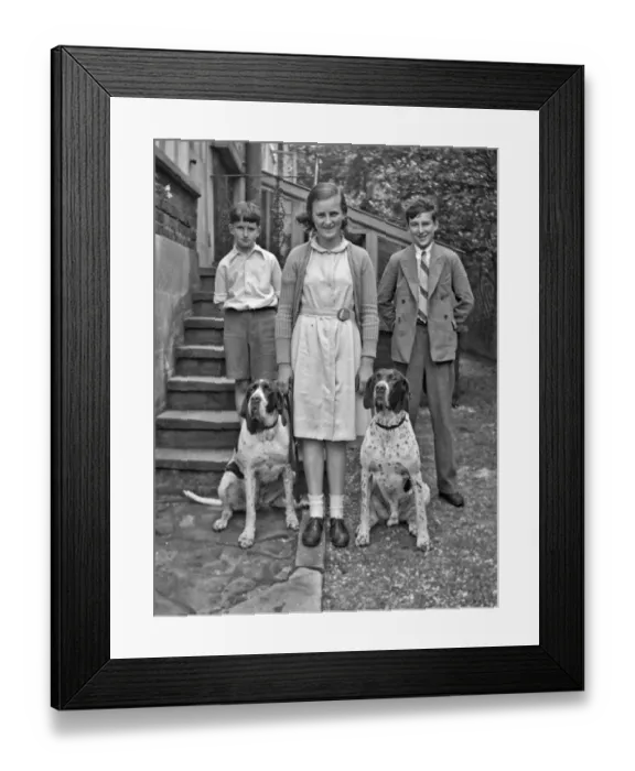 Framed Print : Three children and two dogs in a garden Framed Print : Three children and two dogs in a garden