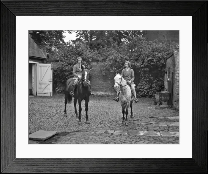 Framed Print : Two women on horseback in stable yard Framed Print : Two women on horseback in stable yard