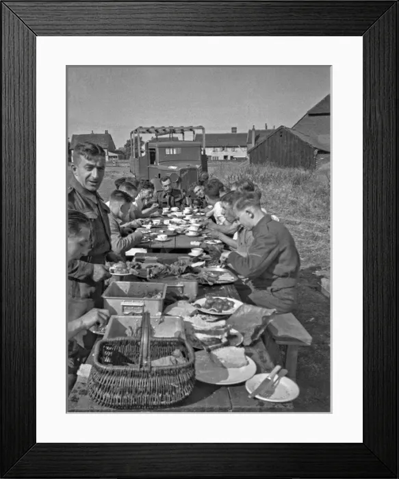 Framed Print : Soldiers eating in the open air at a camp Framed Print : Soldiers eating in the open air at a camp