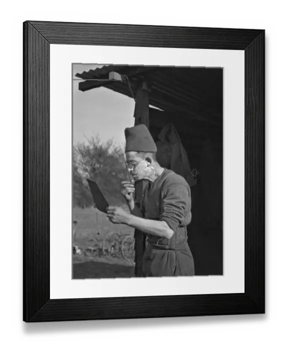 Framed Print : Soldier shaving in the open air at a camp Framed Print : Soldier shaving in the open air at a camp