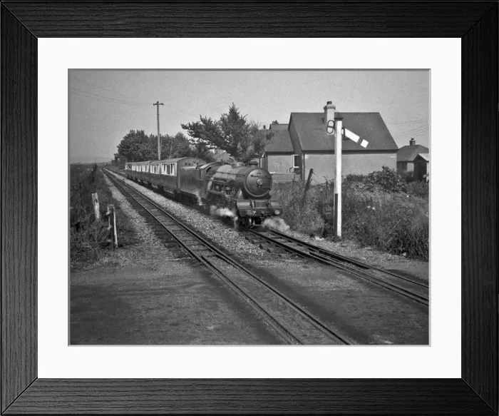 Framed Print : Steam engine and carriages on a railway track Framed Print : Steam engine and carriages on a railway track