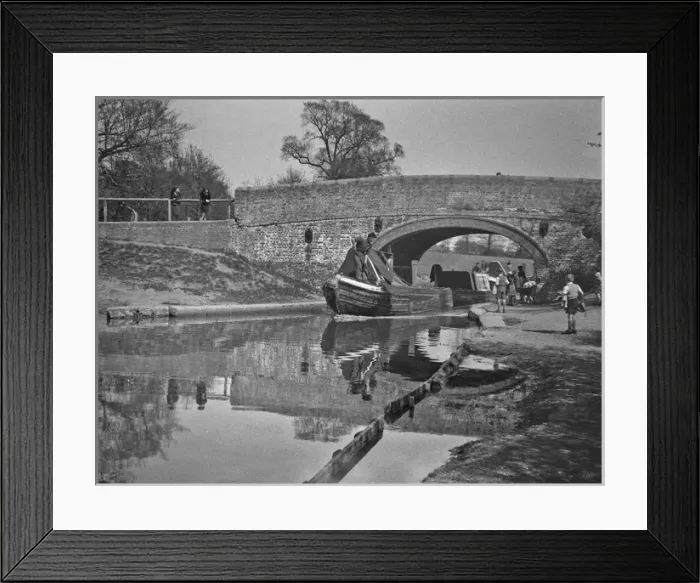 Framed Print : People boating on a canal Framed Print : People boating on a canal