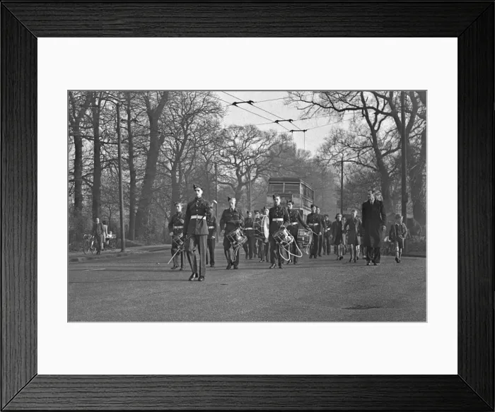 Framed Print : Band of musicians marching along a road Framed Print : Band of musicians marching along a road