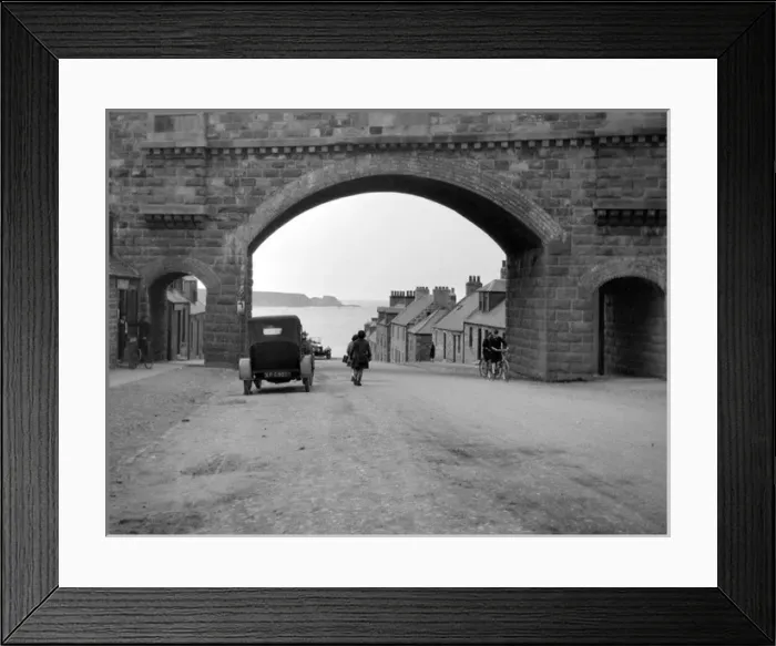 Framed Print : Road with arched bridge leading to the sea Framed Print : Road with arched bridge leading to the sea