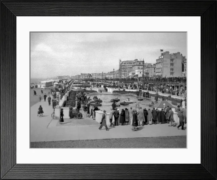 Framed Print : Seaside resort with children on boating lake Framed Print : Seaside resort with children on boating lake