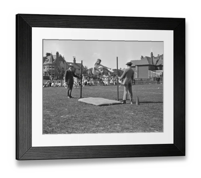 Framed Print : Boy doing high jump at athletics event Framed Print : Boy doing high jump at athletics event