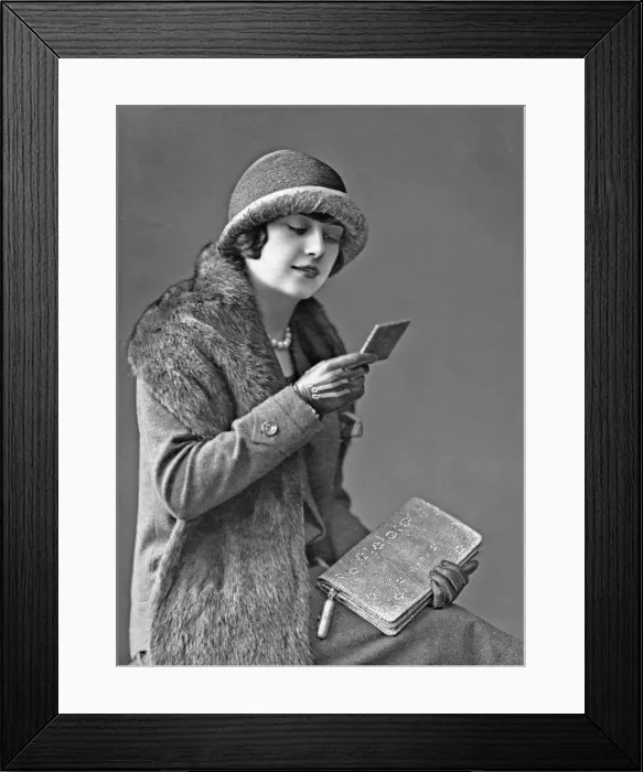 Framed Print : Fashionable woman with hand mirror Framed Print : Fashionable woman with hand mirror