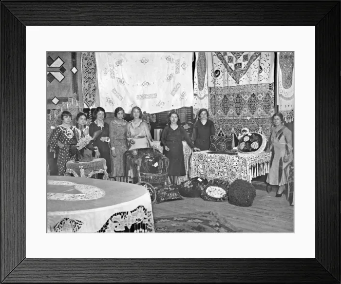 Framed Print : Women with display of homemade arts and crafts Framed Print : Women with display of homemade arts and crafts