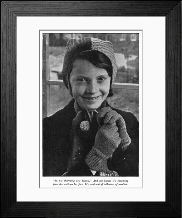 Framed Print : Smiling 1940s girl in a knitted hat Framed Print : Smiling 1940s girl in a knitted hat