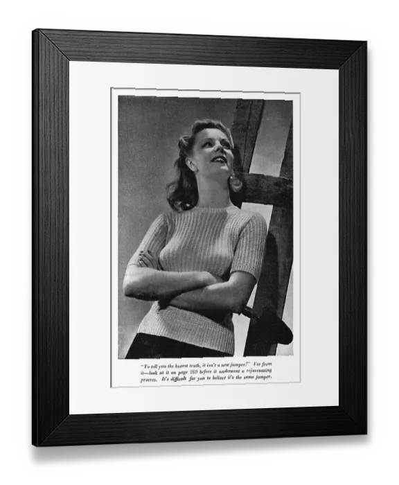 Framed Print : Gardener woman models recycled wool jumper, 1940s Framed Print : Gardener woman models recycled wool jumper, 1940s