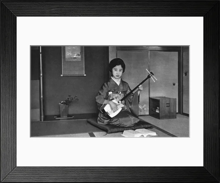 Framed Print : Japan - Music Teacher playing a Shamisen Framed Print : Japan - Music Teacher playing a Shamisen