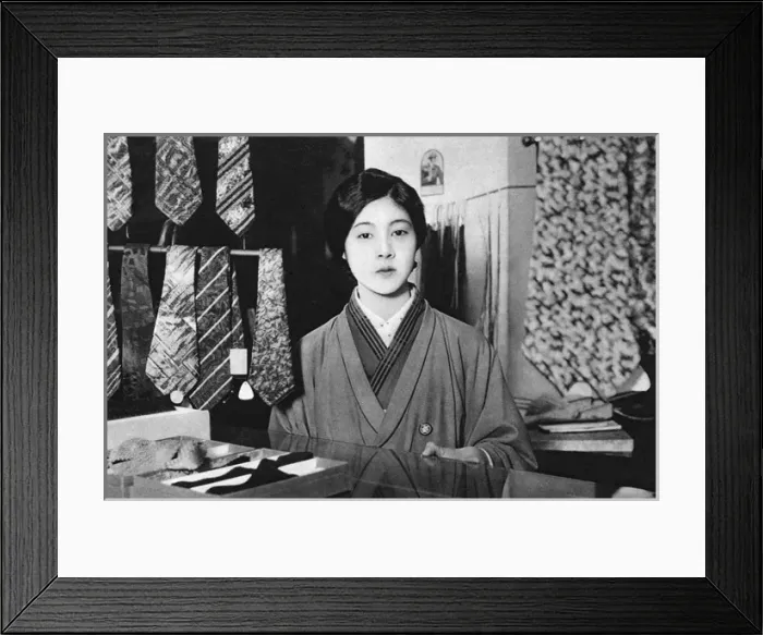 Framed Print : A Japanese sales assistant Framed Print : A Japanese sales assistant