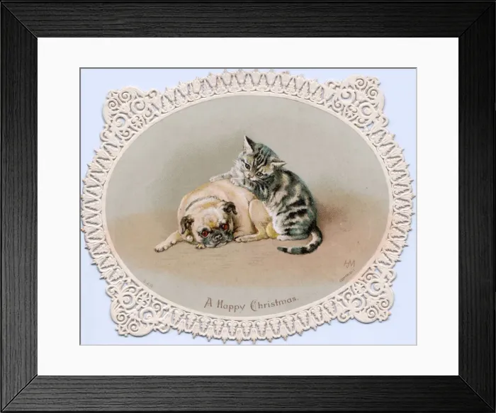 Framed Print : Kitten and dog on a cutout Christmas card Framed Print : Kitten and dog on a cutout Christmas card