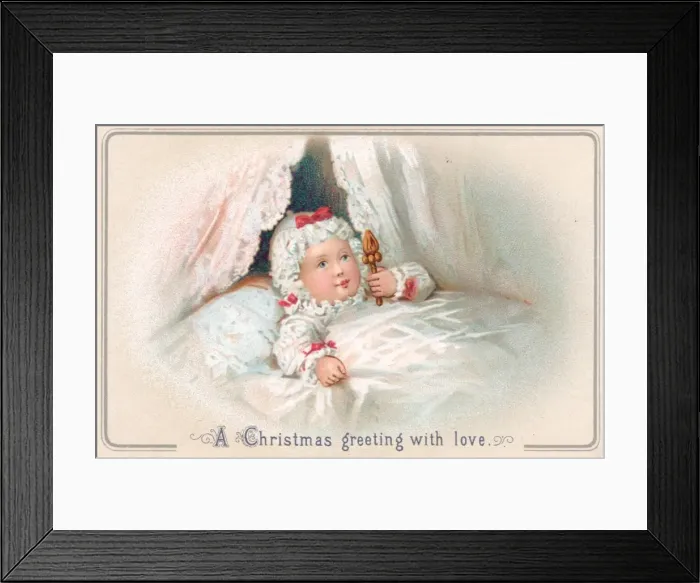 Framed Print : Baby with rattle in a cot on a Christmas card Framed Print : Baby with rattle in a cot on a Christmas card