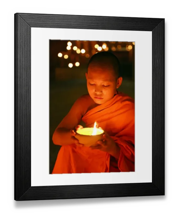 Framed Print : Buddhist Monk at Wat Phan Tao Temple holding candle Framed Print : Buddhist Monk at Wat Phan Tao Temple holding candle