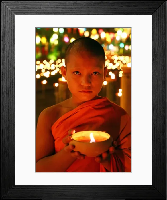 Framed Print : Buddhist Monk at Wat Phan Tao Temple holding candle Framed Print : Buddhist Monk at Wat Phan Tao Temple holding candle