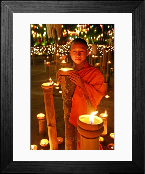 Framed Print : Buddhist Monk at Wat Phan Tao Temple holding candle Framed Print : Buddhist Monk at Wat Phan Tao Temple holding candle