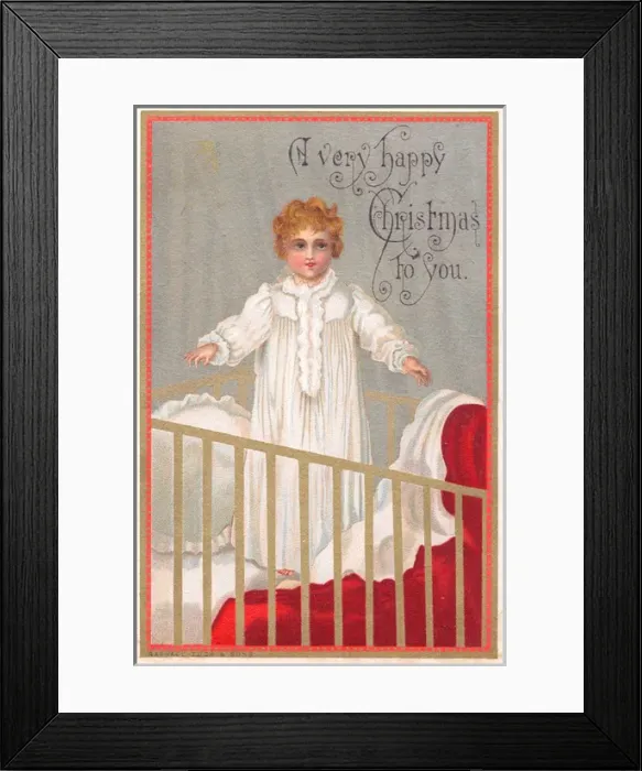 Framed Print : Child standing up in a cot on a Christmas card Framed Print : Child standing up in a cot on a Christmas card
