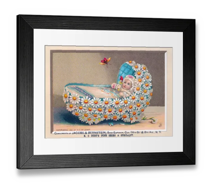 Framed Print : Baby in cradle made of flowers on a greetings card Framed Print : Baby in cradle made of flowers on a greetings card