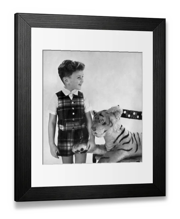 Framed Print : Boy in tartan shorts and waistcoat party outfit 1956 Framed Print : Boy in tartan shorts and waistcoat party outfit 1956