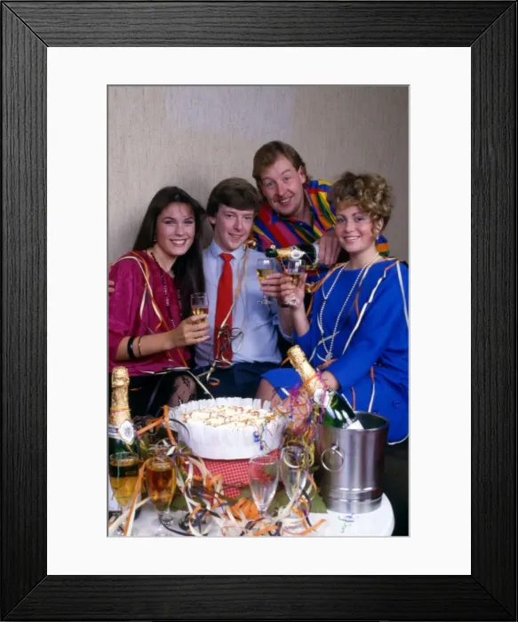 Framed Print : Family celebrating with birthday cake and champagne Framed Print : Family celebrating with birthday cake and champagne