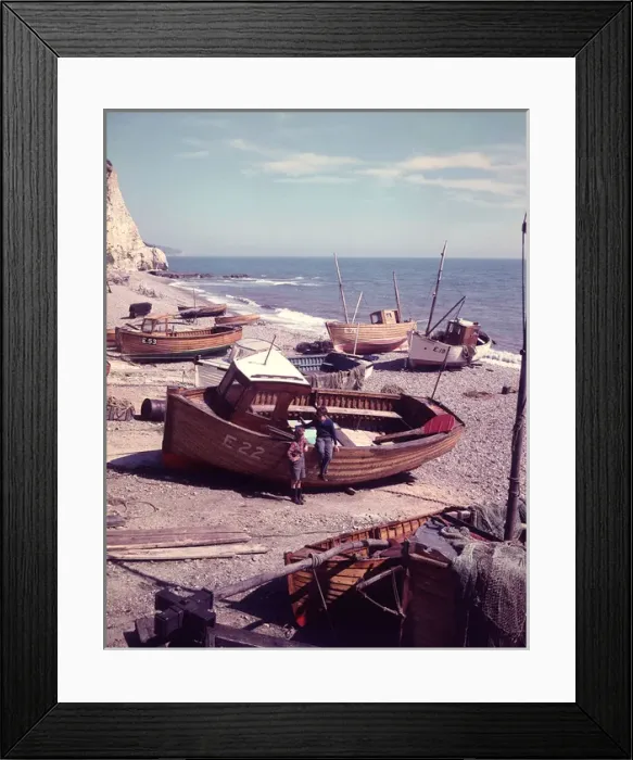 Framed Print : Two boys with boats on a pebbly beach, Devon Framed Print : Two boys with boats on a pebbly beach, Devon