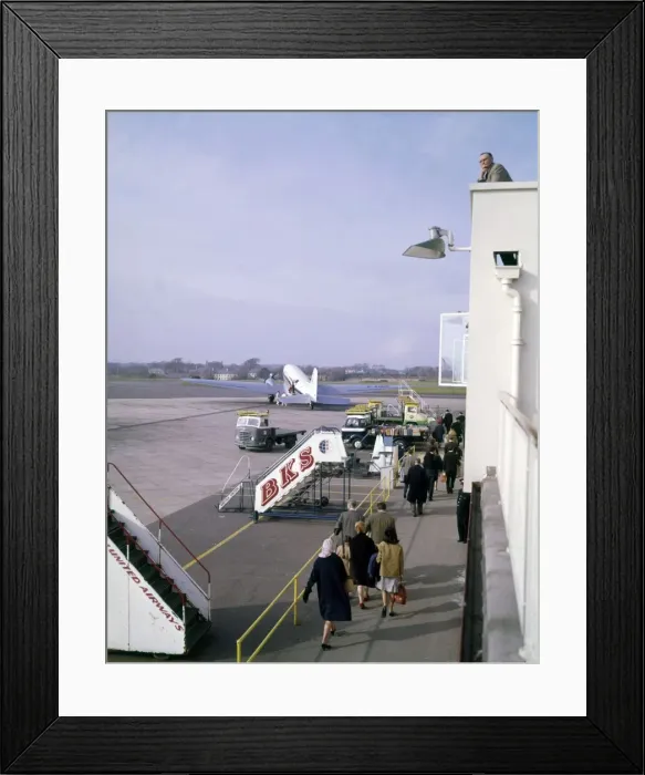 Framed Print : Scene at an airport, with passengers and aircraft Framed Print : Scene at an airport, with passengers and aircraft