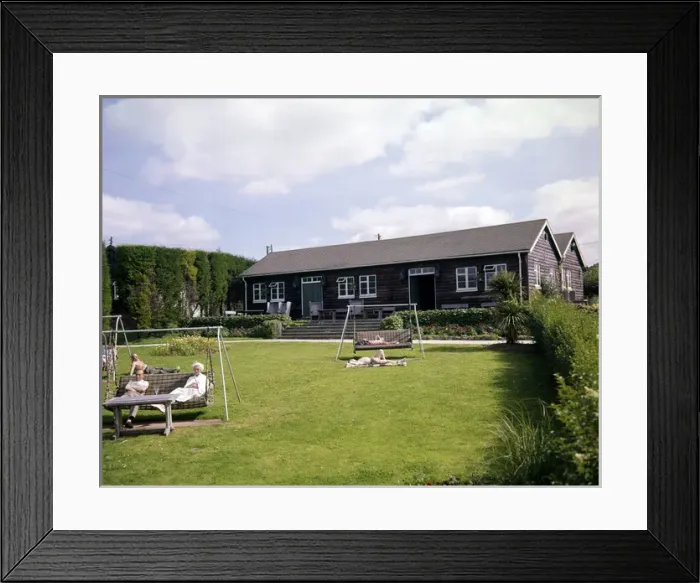 Framed Print : People relaxing at a holiday camp, Devon Framed Print : People relaxing at a holiday camp, Devon
