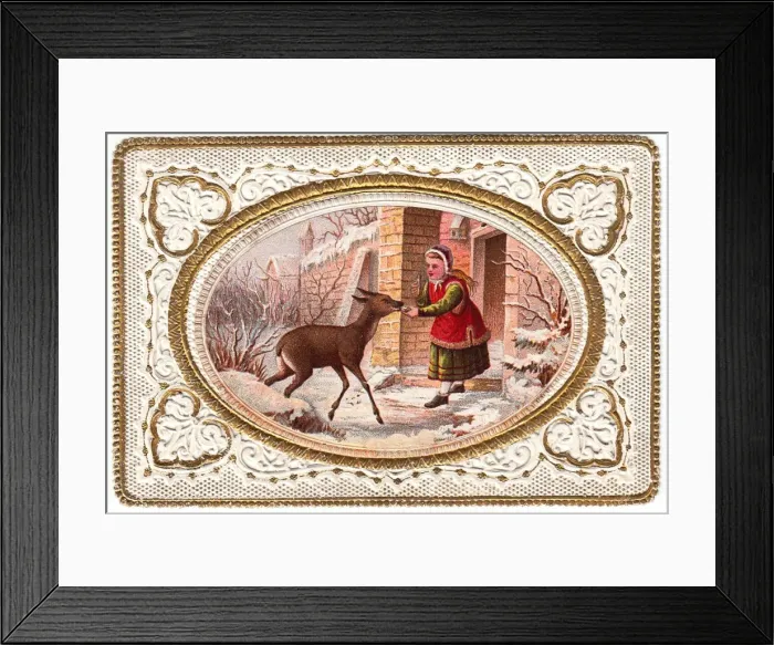 Framed Print : Girl feeding deer in the snow on a Christmas card Framed Print : Girl feeding deer in the snow on a Christmas card
