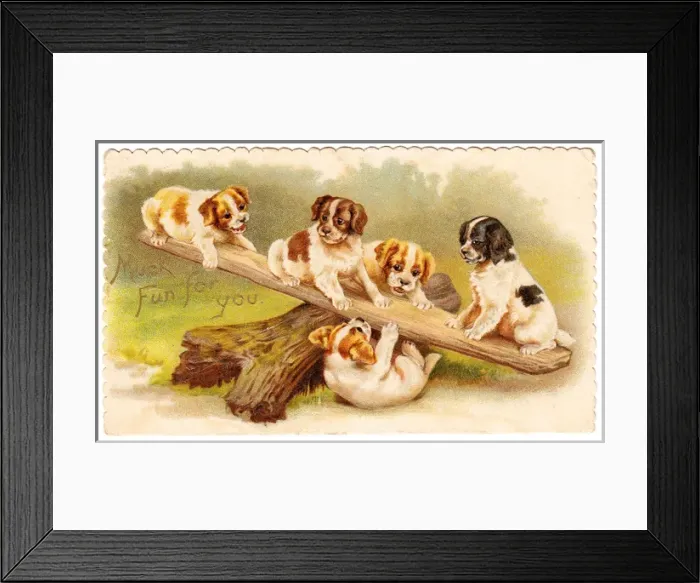 Framed Print : Five puppies on a seesaw on a greetings card Framed Print : Five puppies on a seesaw on a greetings card