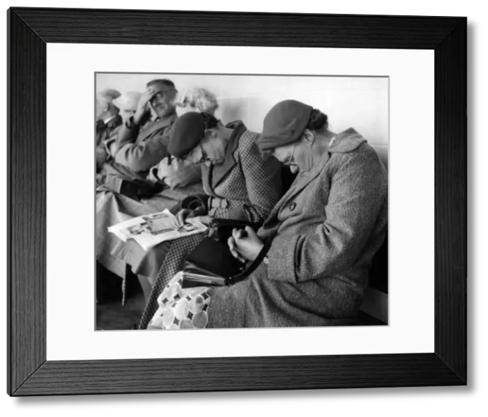 Framed Print : Middle-aged people dozing in Eastbourne, Sussex Framed Print : Middle-aged people dozing in Eastbourne, Sussex