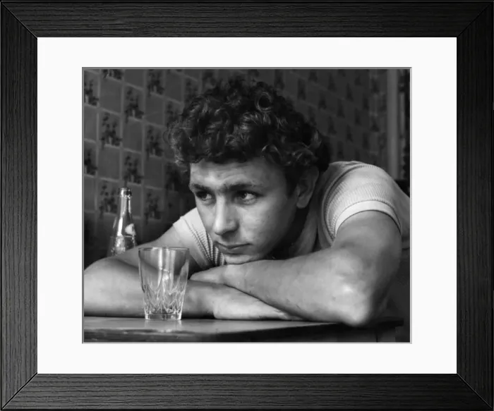Framed Print : Young man relaxing in a cafe Framed Print : Young man relaxing in a cafe