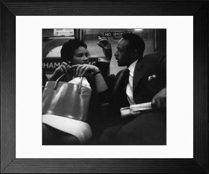 Framed Print : Couple on a London underground train Framed Print : Couple on a London underground train