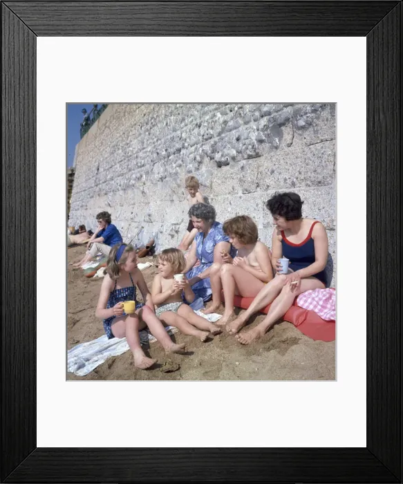 Framed Print : People having a drink on a sandy beach Framed Print : People having a drink on a sandy beach