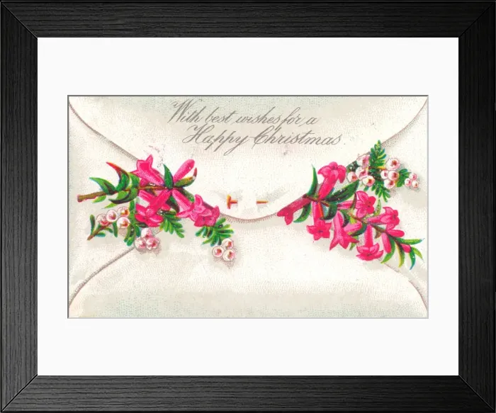 Framed Print : Pink flowers in an envelope on a Christmas card Framed Print : Pink flowers in an envelope on a Christmas card