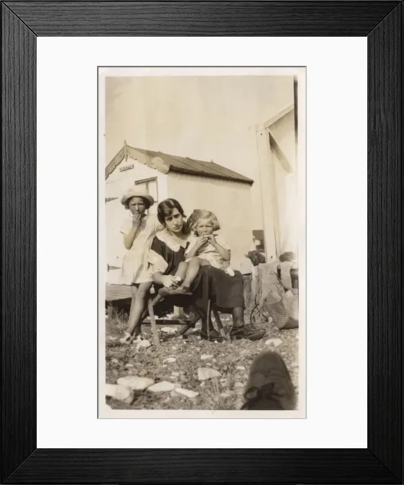 Framed Print : Mother and two daughters having lunch near their beach hut Framed Print : Mother and two daughters having lunch near their beach hut