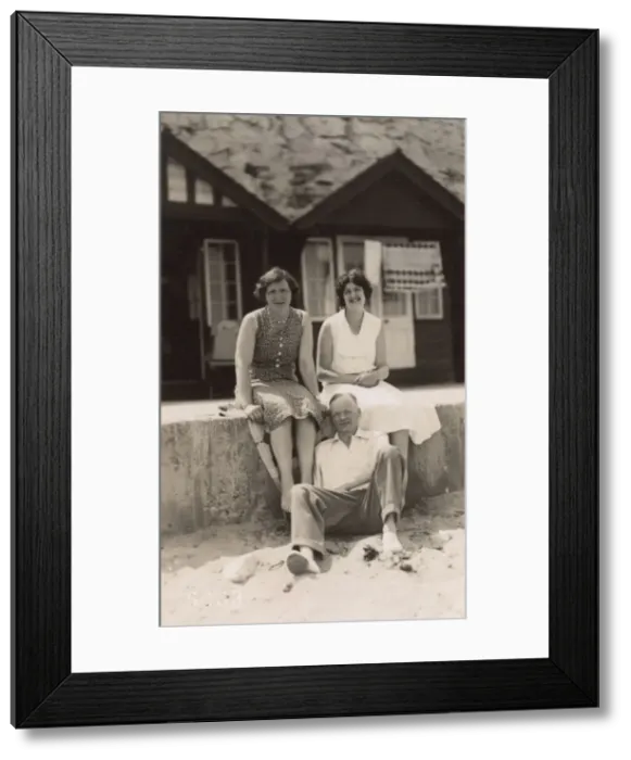 Framed Print : Margate, Kent - A couple and relative rest on the sea wall Framed Print : Margate, Kent - A couple and relative rest on the sea wall