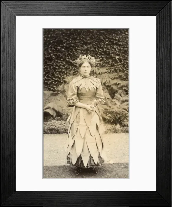 Framed Print : Fancy dress - young woman dressed as a flower Framed Print : Fancy dress - young woman dressed as a flower