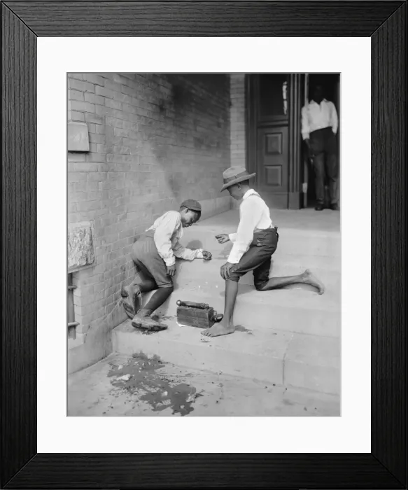 Framed Print : Two African American shoe shine boys playing a gambling game Framed Print : Two African American shoe shine boys playing a gambling game