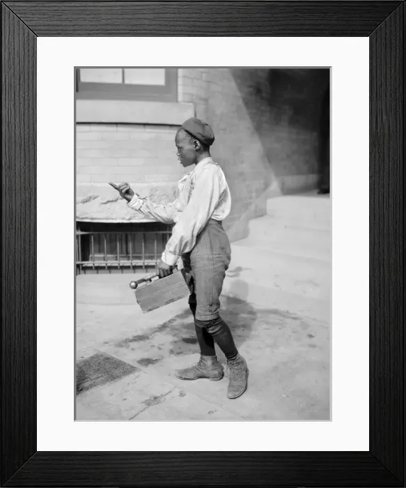 Framed Print : Shoe shine boy looking for business in America Framed Print : Shoe shine boy looking for business in America