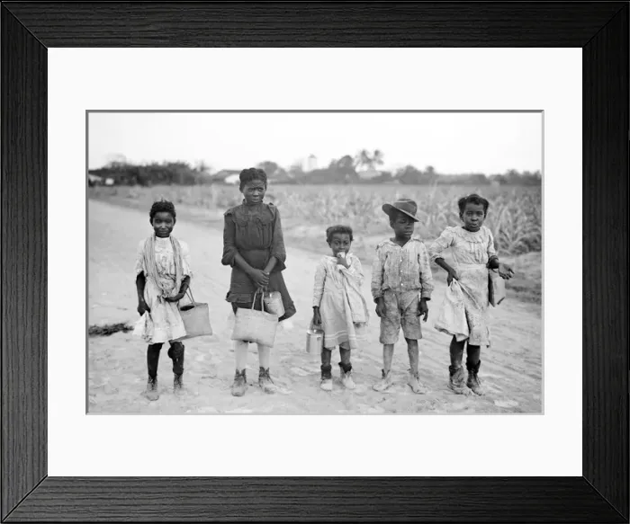 Framed Print : A group of African-American children on a country road in Am Framed Print : A group of African-American children on a country road in Am
