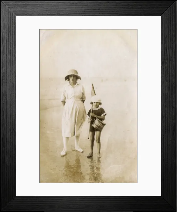 Framed Print : Mother and child standing on the beach - France Framed Print : Mother and child standing on the beach - France