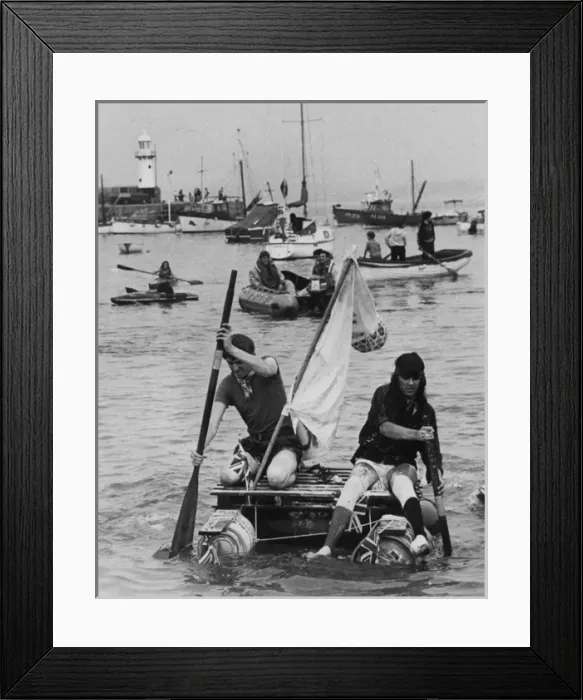 Framed Print : Two men competing in a raft race, St Ives, Cornwall Framed Print : Two men competing in a raft race, St Ives, Cornwall