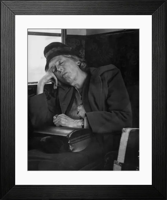Framed Print : Woman asleep on a train Framed Print : Woman asleep on a train