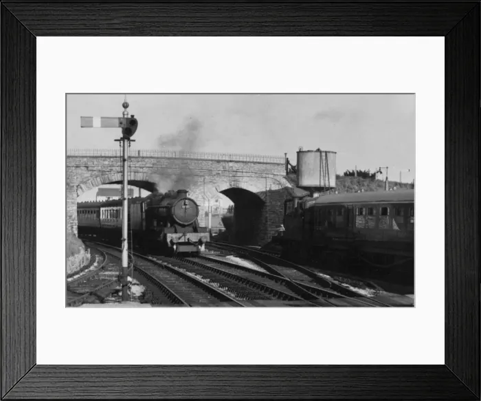 Framed Print : Steam locomotive passing under a bridge Framed Print : Steam locomotive passing under a bridge