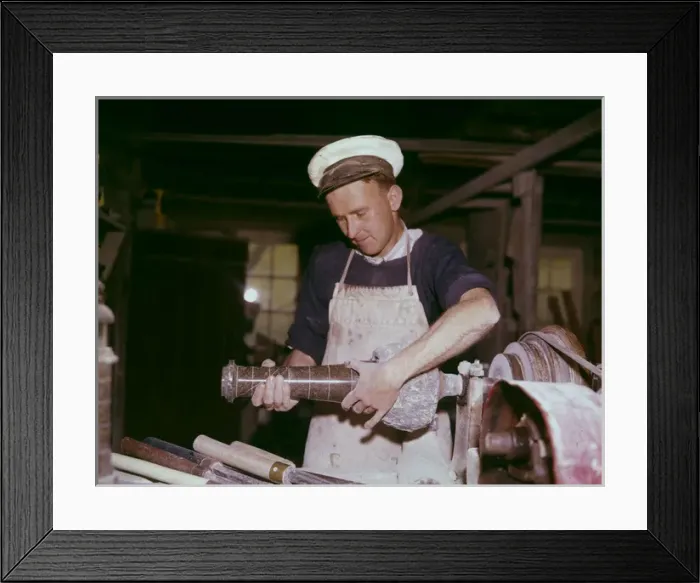 Framed Print : Stonemason working with granite in a workshop Framed Print : Stonemason working with granite in a workshop