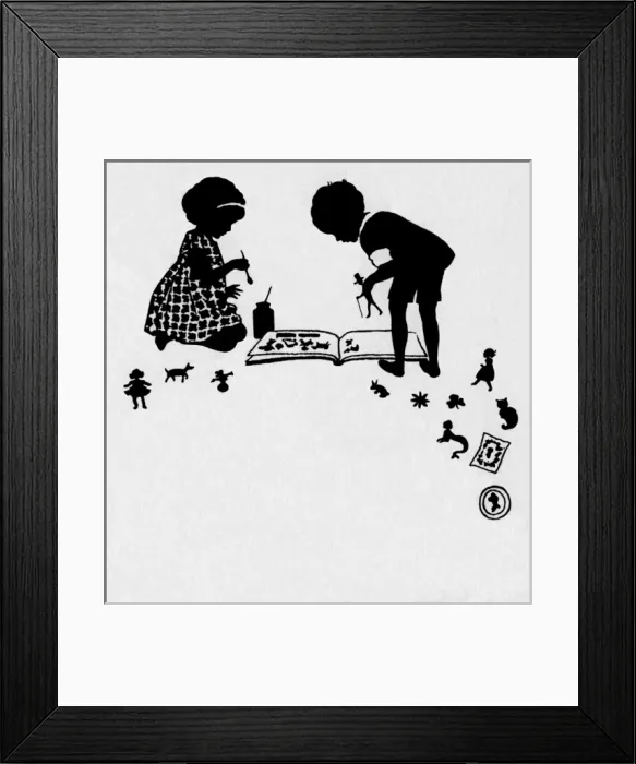 Framed Print : Pasting scraps into an album Framed Print : Pasting scraps into an album