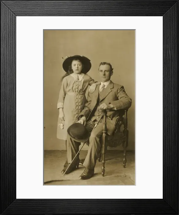 Framed Print : Studio portrait, man and girl Framed Print : Studio portrait, man and girl