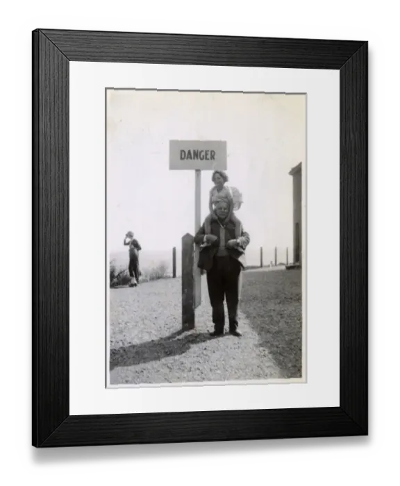 Framed Print : Young girl on Grandfathers shoulders by Danger sign Framed Print : Young girl on Grandfathers shoulders by Danger sign